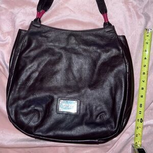 Dark colored genuine leather purse by Velez Bags